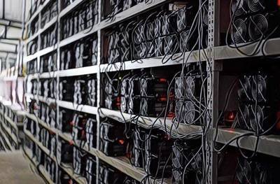 An aerial view of a state-of-the-art mining farm powered by renewable energy, showcasing rows of efficient mining rigs under solar panels